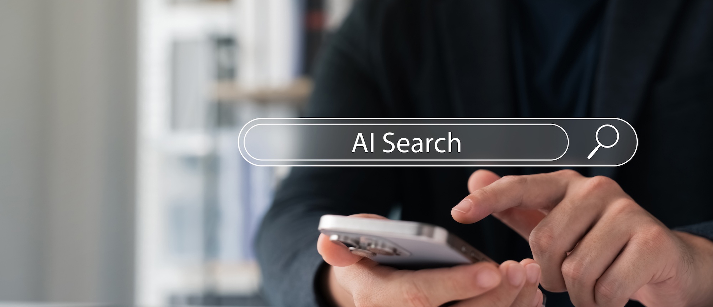 A person using a mobile phone to do an AI search