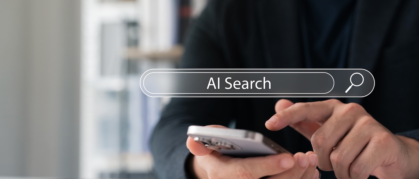 A person using a mobile phone to do an AI search